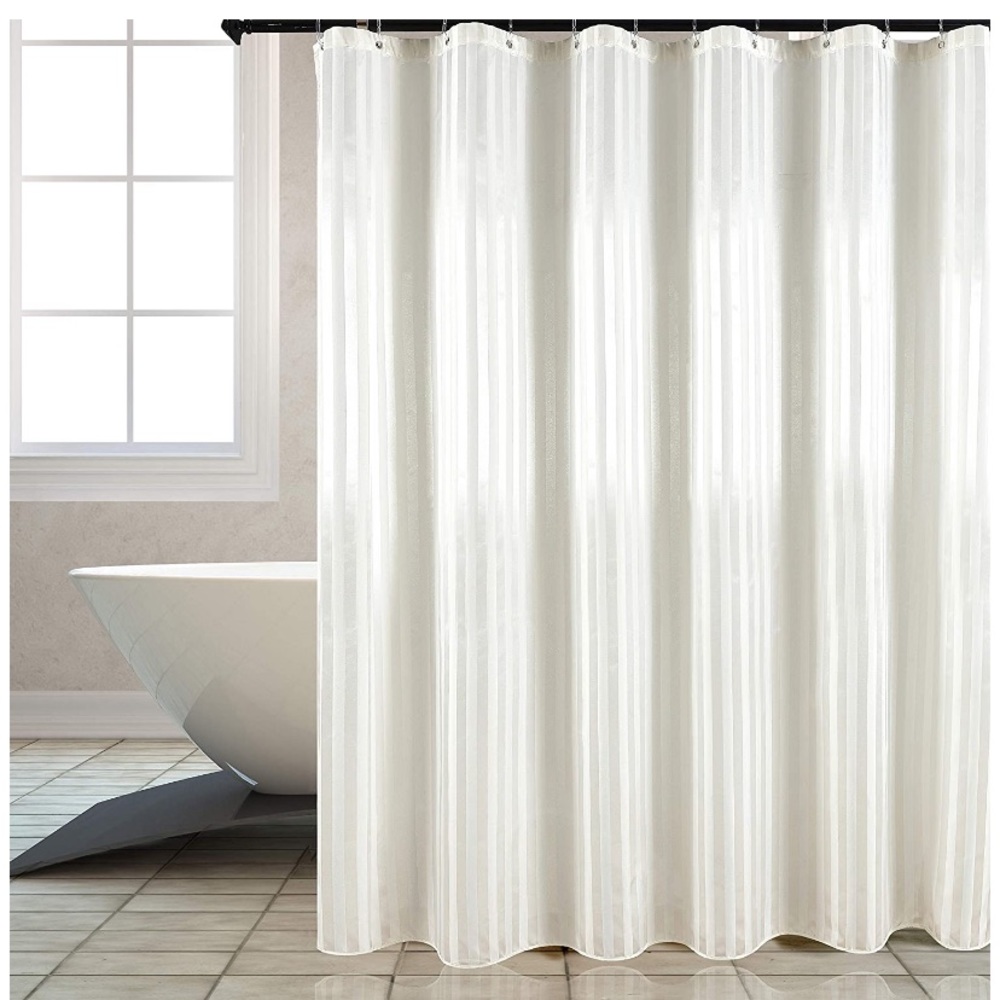 Ivory shower curtain with clear plastic hooks